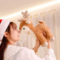 Plush Reindeer and Christmas Tree