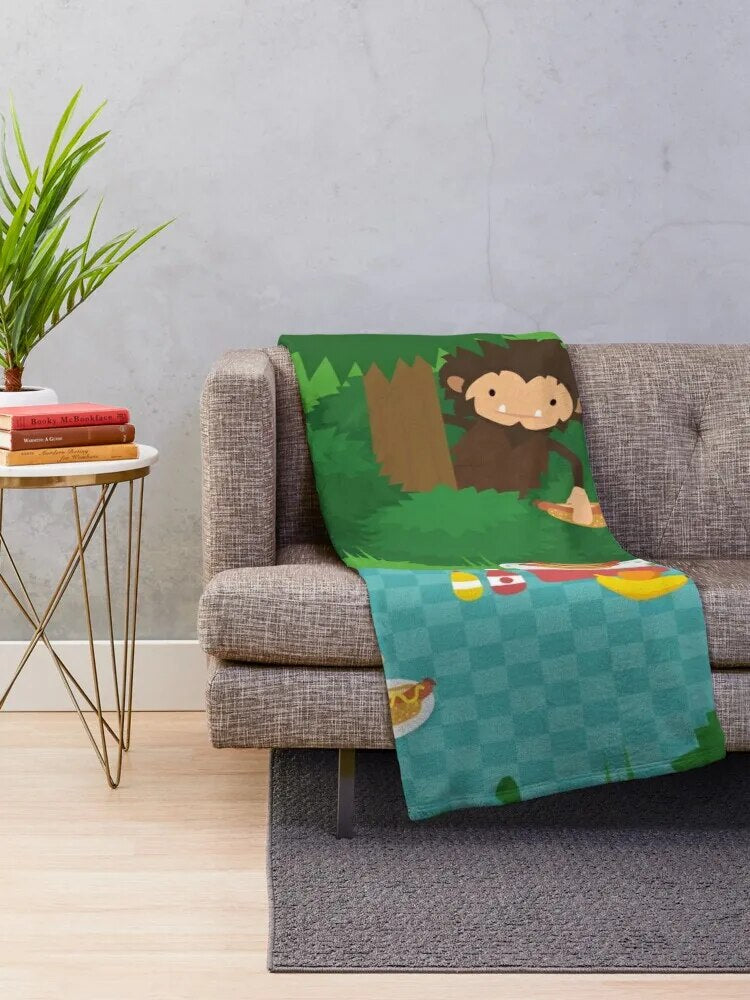 Sneaky Sasquatch Picnic Throw Blanket